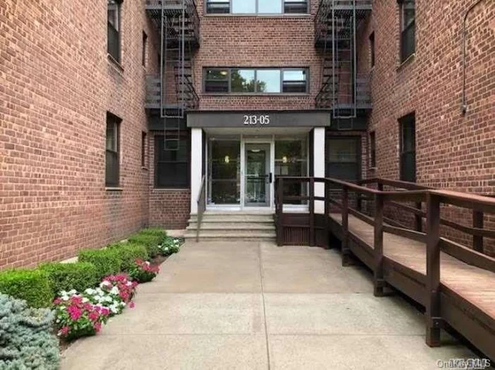 Sunny, bright and large one Bedroom on the quiet tree line St. SD26, Low Maint. included Heat, Water, Cooking Gas. No RE Tax. Bus stop at the corner, Express Bus(Q88, QM5) to city. New Windows, New A/C, New GYM and New Elevator coming soon. Outdoor Ig Olympic size swimming Pool, Professional Tennis Court, Children Playground. No Flip Tax, Can sublet after 3 years