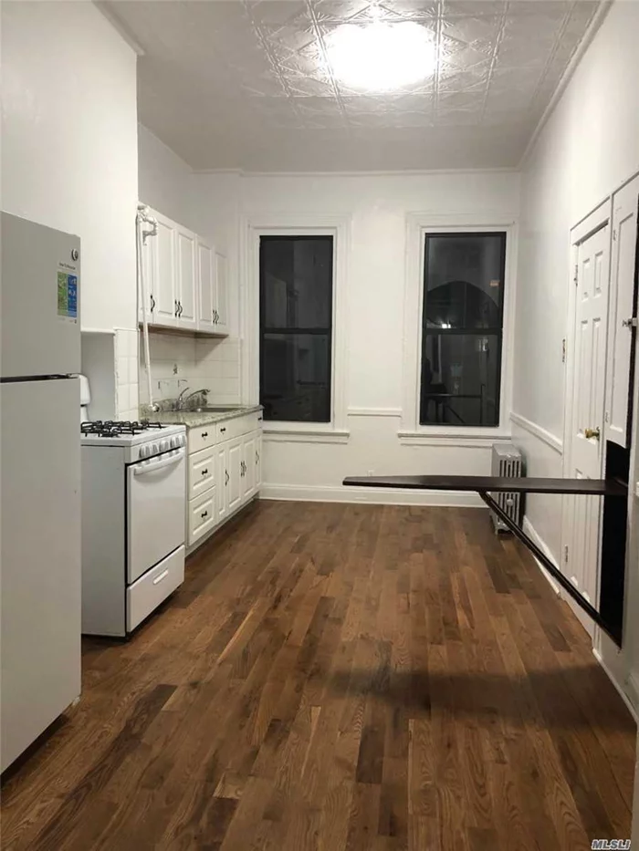 Welcome in Bushwick- enjoyable Living ! This Beautifully Renovated 2 Bedroom Apartment Offers Charming Living with High Ceilings, plenty of storage room, quality oak hardwood floors, very large eat in kitchen with wall/open portable bar ( piece of history ) and much more ... Close to transportation, lovely restaurants to eat, beautiful park, etc.