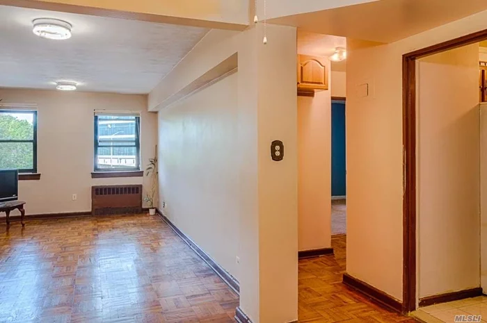 Location! Location! Location ! Beautiful Large One Bedroom Near Transportation . Minutes To E&F Train Close To All Shopping And Major High Ways Van Wyke & Grand Central Pkwy. One Block To Queens Blvd, located to all local amenities.