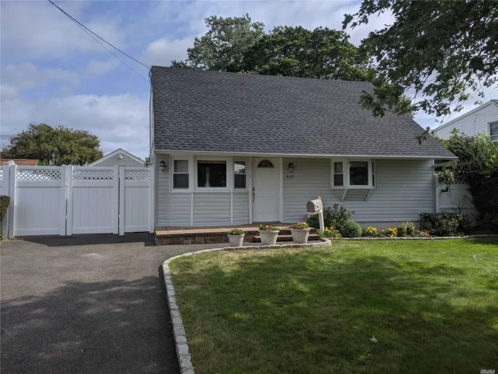 Diamond Cape Home. Home Features Update Eat In Kitchen With Stone Counter top, Large Bedrooms, and Hardwood Floors Throughout. Nice Backyard With Large Detached Garage. East Meadow Schools.