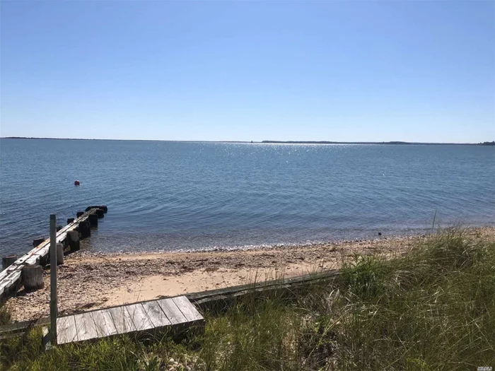 Location Location Location!! Gorgeous views of Bug Light, Orient State Park and much much more! This 3br 1.5ba house that is in need of TLC boasts 70 feet on Peconic Bay.