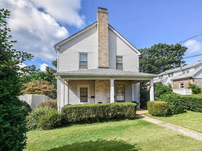 Glistening first floor apartment in a private home with separate entrance, porch, and lovely yard. Redone Kitchen, gorgeous oak floors throughout, and newly painted. Sparkling!