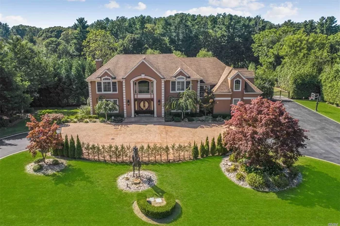 Spectacular 6, 200 S/F, 6 Bdrms, 6.5 Bthrms Center hall Colonial set on 2 lush acres featuring a grand 2-story entryway w/ winding staircase. Enjoy the gourmet eat-in kitchen w/ breakfast room & butlers pantry, leading to banquet sized dining room. Family Room opens to a beautiful stone patio w/ an in-ground heated saltwater pool & waterfall. Full finished basement with playroom, perfect indoor/outdoor open layout for entertaining with outdoor kitchen. Complete this grand home w/ 3 car garage