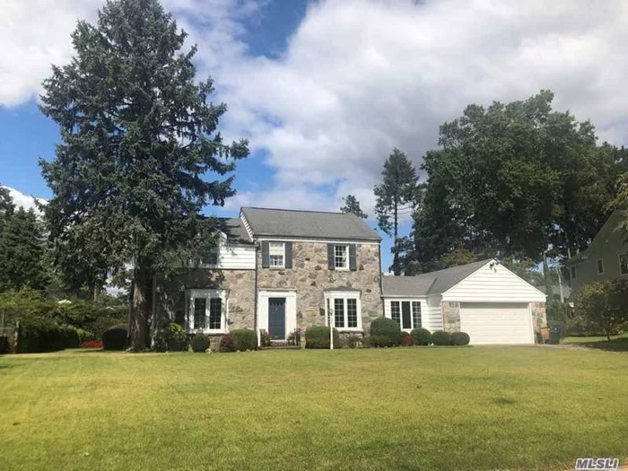 Lovely Center Hall Colonial on beautiful Flower Hill street. House is ready for new owners to make it their own. Fabulous, flat private yard. Sold As Is.