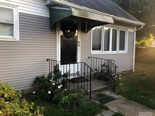Full house rental close to Babylon RR and town. 2 BR, 1 Full Bath, EIK, Livingroom and plenty of storage upstairs. Beautiful yard and place to park 2 cars and full use of garage. Landlord requests credit score above 650.
