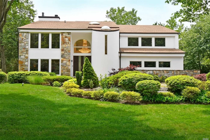 Stunning best describes this fully renovated contemporary style home located in the exclusive gated community of Hamlet Estates. This home boasts spacious rooms, inviting great room with duo gas fireplace, designer bathrooms, extensive millwork, custom designed EIK with commercial grade appliances and quartz countertops. Professionally landscaped private property with gazebo. Award winning Manhasset schools .