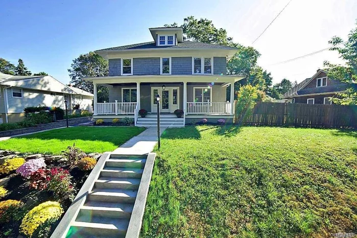 Classic elegance, in this beautiful hundred year colonial, that has been brought back with modern day style and conveniences. Located a few blocks from Garvies Point, this North Shore home is an absolute steal with endless amenities. This property is about 1/3 of an acre, with an oversized two car garage, and fenced in yard. A grand front porch welcomes all who come into a beautiful entranceway. A great room with a fireplace, opens to a brand new chefs kitchen, with, Carrerra marble countertops,