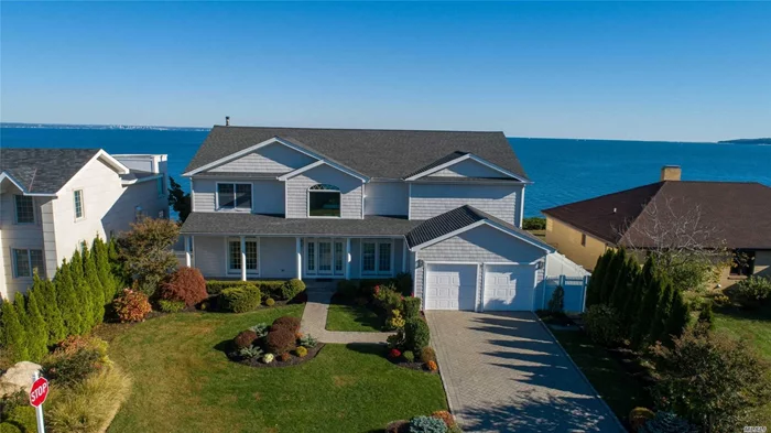 Gorgeous waterfront property with breathtaking views of Connecticut in the prestigious Oak Point community with private beach for residents only. House shows extremely well with the wow factor, fabulous entertaining rooms with a gracious open floor plan. Large floor to ceiling windows with spectacular views of the water. Enjoy the Lifestyle. No Flood Zone. $450 yearly HOA. Owner has started the tax grievance process for 2020.