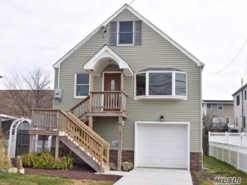 Diamond condition raised home with water views. Vinyl siding, Trek steps with Portico, Stainless Steel Frigidaire appliances, Shaker Cabinets, Granite counter tops with counter bar and drop lighting, Kohler faucets, 3/4 inch Hardwood floors, Baix Boiler.