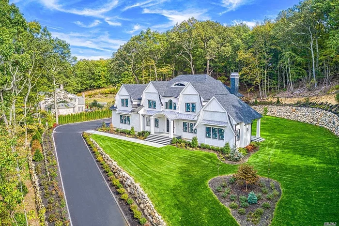 Exquisite Laurel Hollow masterpiece by one of Long Island&rsquo;s premier builders. 5800 square foot 6 bed/6.5 baths, 3-car garage, 10&rsquo; basement, CSH schools, custom mill work incl. two-story raised panel foyer, coffered ceilings, 2-story family room, 2 fireplaces, 2 laundry rooms, Huberwood ZIPsystem w/ spray foam insulation, Extensive masonry package including outdoor covered pavillion, professionally landscaped! This home is now 100% complete as of 2/7/20!!