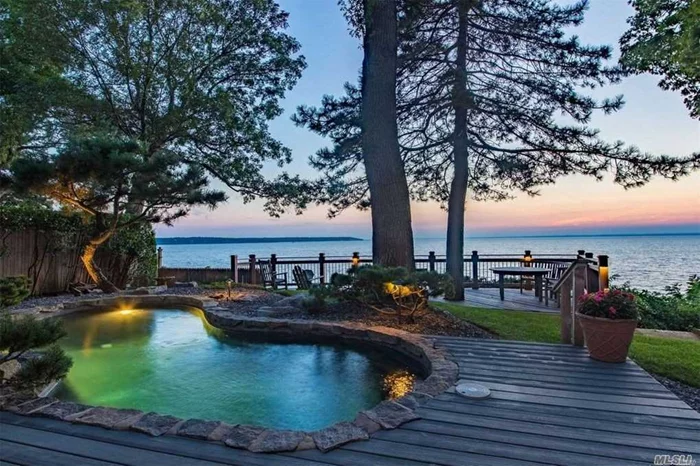 Fabulous waterfront home with panoramic views to CT. Inviting floor plan.. Spectacular sunsets, heated in ground pool. Perfect floor plan for entertaining year round. Walls of glass surround this unique and very special waterfront home.