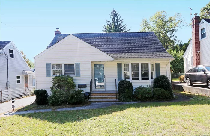 Cute 4 Br 2 Bth Cape Has A Full Second Floor Dormer For Spacious Rooms Plus Partially Finished Basement. Open Layout. New High-Efficiency Gas Boiler, New Full Bath on 1st Floor, New Gas Stove. Large Yard. Beach And Golf Course Rights. Close to LIRR, Restaurants, Shopping, Parks, Beaches.