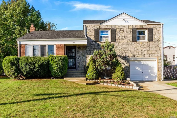 Fieldstone split features a bright living room with bay window which opens up to formal dining room and eat-in-kitchen. 2 spacious bedrooms + master bedroom with an en suite bathroom. Hardwood floors throughout the entire home, and finished basement with high ceilings and hi-hat lighting. This must see home sits on a large 62X100 lot and is Close To Park, Shopping, Parkways! New single layer roof installed in September 2019.