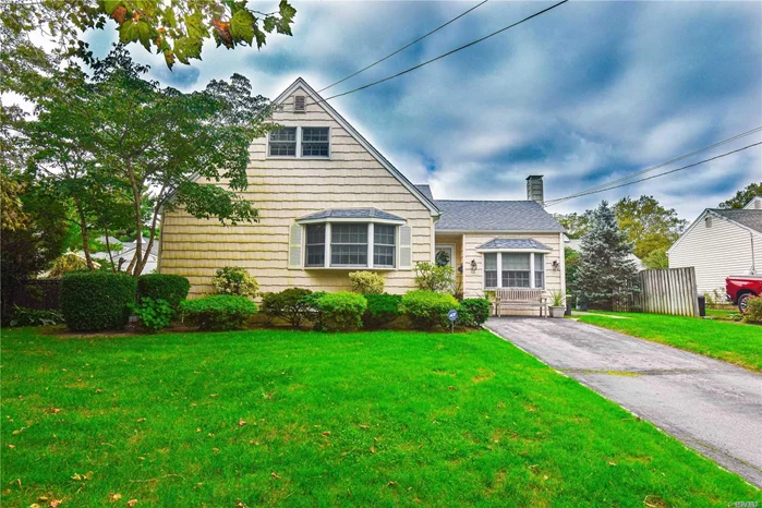 This Charming Split on a serene street in Amityville Village can be your new home! Bright spacious rooms with brick fireplace in Family room and a huge den/playroom. New windows, wood Flooring and updated bathrooms. Florida Room opens to beautiful heated in-ground pool (new vinyl liner) with auto awning. Walking distance to town. Updated roof, siding and gas burner. Really a Gem - won&rsquo;t last!