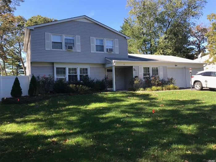 A Lovely Updated Center Hall Colonial Features: Foyer & Kitchen, EIK W/Granite Counter Tops/Cherry Cabinets/SS Appliances, All Updated Baths & Hardwood Floors, French Doors Lead To Brick Back Yard Patio To Spectacular Back Yard W/Brick Walkway and Fruit Trees (Apple, Pear Dates & Pecan) Massive 2 Car Garage, New Fully Fence, Top Of The Line Washer & Dryer. Bright & Airy (Master Suite W/On Suite Bath)....