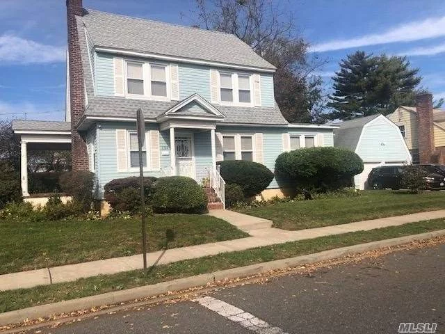 THIS HUGE CORNER LOT PROPERTY COLONIAL BOASTS 5 BEDROOMS, 3 FULL BATHS, 2 CAR GARAGE, UPGRADED ELECTRICAL, 2 YEAR OLD ROOF, HARDWOOD FLOORS, HUGE ATTIC, FULL FINISHED BASEMENT W/ FULL BATH AND OUTSIDE ENTRANCE! GREAT FOR A LARGE FAMILY! TREMENDOUS POTENTIAL! PRIDE OF OWNERSHIP! CLOSE TO TRANSPORTATION, SHOPPING, AND PARKWAYS! TOO MUCH TO LIST! WONT LAST! A MUST SEE!