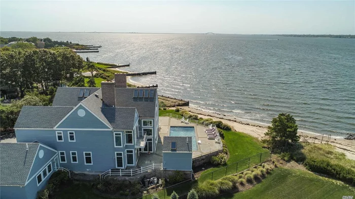 This One Of A Kind 6, 200 Sq Ft Masterpiece Is Set Back on Over an Acre of Waterfront Property. This Unique Home Offers One Of A Kind Views of The Great South Bay And Long Islands Beautiful Bridges. Fully equipped with Its Own Private Beach, In-Ground Pool Overlooking The Bay. Fully equipped Pool House With Wet Bar and Full Bathroom!!