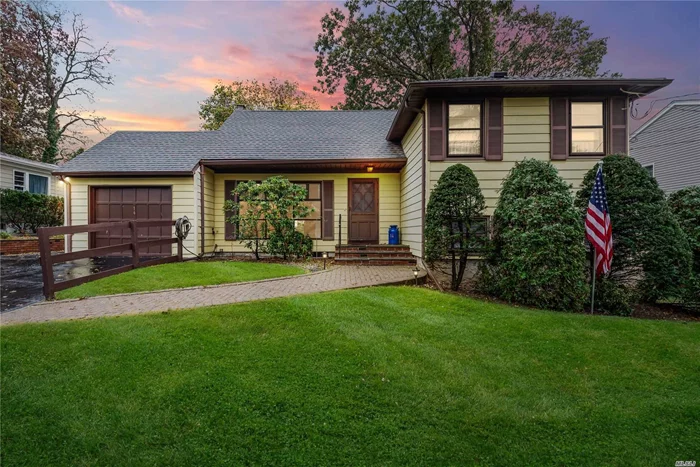 Enjoy your life in a home that has a cozy space for everybody! Sunny extended living room, den w fireplace, playroom/gym, spacious eat-in-kitchen, fenced in yard, big driveway - great for boat owners. Brand new roof and gutters, NON flood zone, Award Winning Locust Valley School District. So many possibilities to make it your own! Come see for yourself!