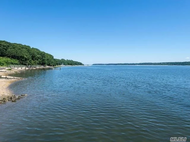 Idyllic waterfront home with spectacular water views and one of the few remaining deep water docks in this harbor. Enjoy swimming, kayaking, sailing from your own private beach! Beautifully secluded yet only minutes to the charming hamlet of Oyster Bay.