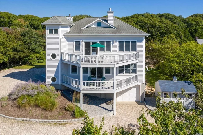 Beautifully Designed 2 Story Lake Front Home with Water Views of the Sound is Now Available for Year Round Rental.  Bright and Airy Open Concept Living Space, 5 Decks to Enjoy Multiple Views and a Wood Burning Fire for Cozy Nights.