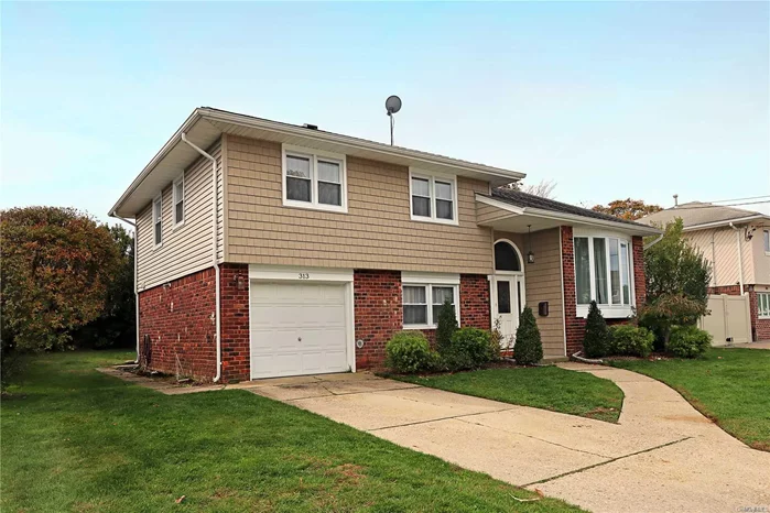 Beautiful Mid-block home, completely renovated NEW in 2014. Everything from siding to windows, doors, landscaping, etc. was done. This home has 2 full baths, CAC, GAS, and is Centrally located to parkways, parks & recreation, shopping and more. Farmingdale Schools. NOT TO BE MISSED.