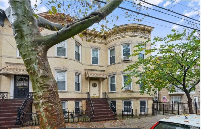 BEAUTIFUL 2 FAMILY SEMI-DETACHED BRICK HOME WITH LARGE PRIVATE DRIVEWAY AND 2 CAR GARAGE, 3 BEROOMS OVER 2 BEDROOMS AND LARGE FULL BASEMENT , WASHER AND DRYER, HARDWOOD FLOORS, NEAR SHOPPING AND TRAIN TO MANHATTAN
