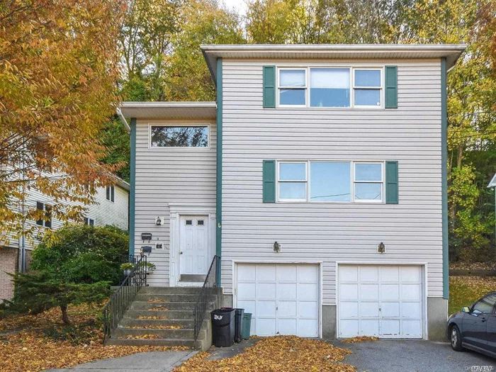 Lovely, fresh and bright townhouse. Newly done kitchen, gleaming wood floors, one car garage, half basement. Convenient to all.