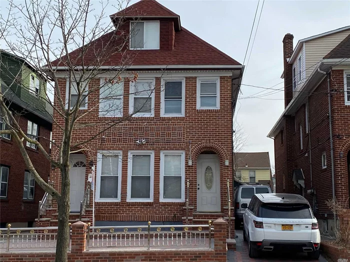 With a highly desirable location, this stunning 3 family brick has four apartments plus full basement and comes with 7 bedrooms, 5 baths, finish basement, private driveway with 2 garage, new roof, new driveway and back yard with pavement stone.