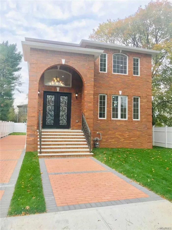 Spectacular Brand-New large brick colonial in very convenient neighborhood. Cathedral grand foyer. Custom-made spiral staircase. Marble Center-Island gourmet kitchen. Central vacuum system. Spacious master bedroom suite. Mother&rsquo;s bedroom on 1st floor. 2nd foor laundry room. Enclosed large back patio 4000 sq ft living space. Easy to commute. Near Bayside LIRR and Northern Blvd bus stops and shops. School district #26.