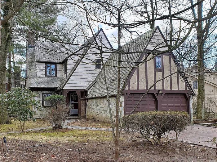 Sunny charming Tudor with old time quilty charm North schools quick access to highway