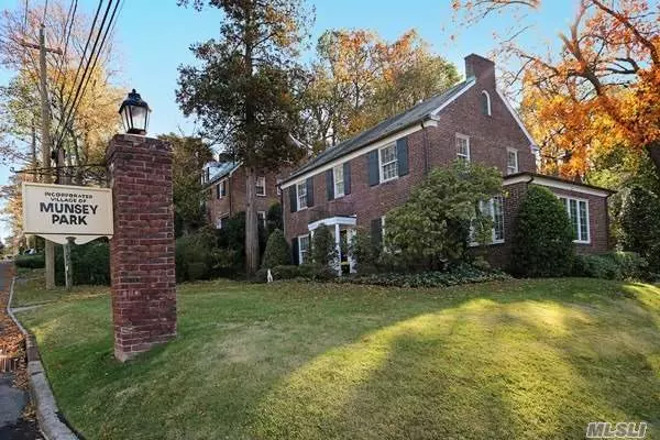 Brick Center Hall Colonial with Slate Roof in the Incorporated Village of Munsey Park. 4 Bedrooms, 3 Full Baths, 2 1/2 Baths, Walk-Up Attic. Fully Finished Basement with 1/2 Bath, 2 Car Garage Slate Patio, CAC, Sprinkler System, SD #6.