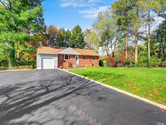 This Lovely home has Been Completely Renovated. Open Floor Plan ,  Roof is 2yrs old, New Siding, New Windows, Electric Garage opener, Hardwood Floors, Hi hats through out,  SS appliances, granite counter top ,  CAC, Double wide driveway , Ready to Move in