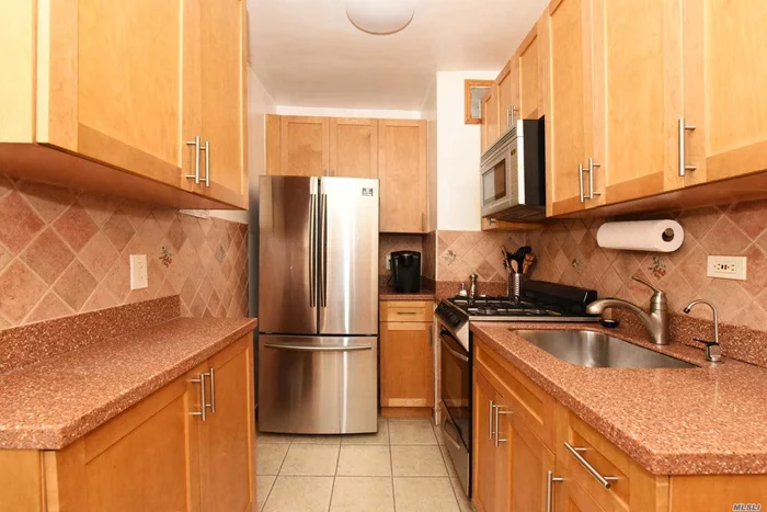 Meticulously updated 1 bedroom apartment with stainless steel appliances in the Eden Rock building. This pet friendly building features a doorman, laundry room, and a 24 hour gym. Conveniently located within minutes to buses, transportation, shopping, Briarwood Station, and the E and F trains. Ready to move in.