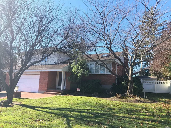 Expanded split in perfect location. Move in condition. Beautiful wood floors, updated baths, newly finished basement, lovely yard. Expanded dining room and kitchen with granite and SS appliances.