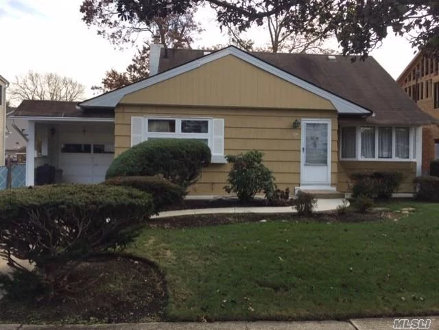 Great Home and Location!!! Nestled in the heart of Massapequa Park this Spacious Home features: Hardwood Floors, Anderson Windows, 4 Bedrooms, 1 Bath, Large Living Room, Full Finished Basement & 1 Car Garage. Close to shopping and restaurants. Call today!
