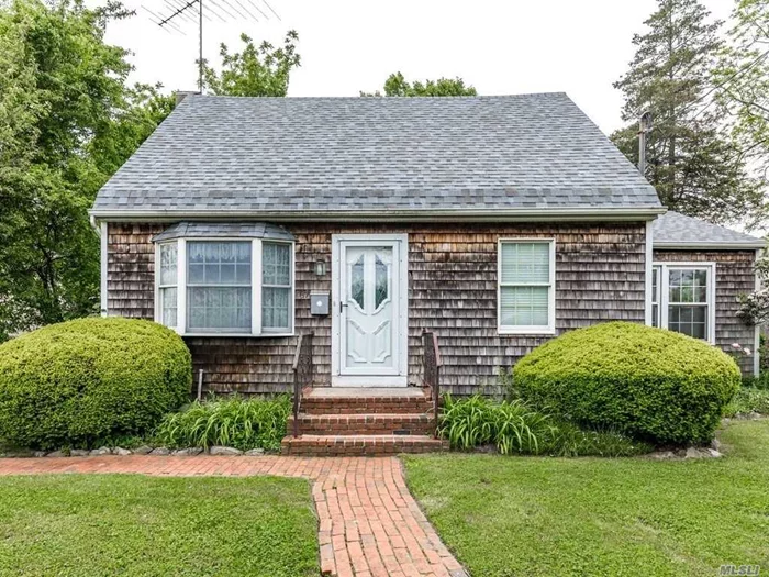 New England Expanded Cape With Rear Dormer On Second Level. This Home Features Large Updated EIK With Vaulted Ceilings. Roof is Updated Architectural Shingles, Full Unfinished Basement. Bring Your Creativity And Dreams And Make This A Happy Home For Your Family That Is Affordable.