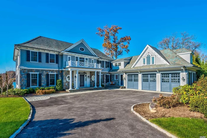 Newly Designed and Built This Connecticut Stone and Shiplap Center Hall Colonial with a Dock is Situated on a Private Road in Plandome Overlooking Manhasset Bay. Offering 7 Bedrooms, 6 Full Baths, 3 Half Baths, School District #6.