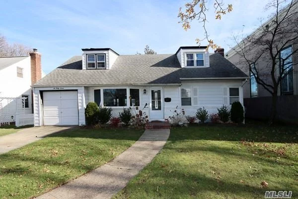 Lovely Cape with updated kitchen, den with fireplace, hardwood floors, huge yard. Basement is not included in rental. Close to shopping & house of worship.