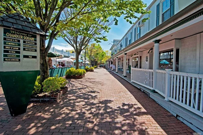 Unit above Retail Stores @ Chandler Square in the Heart of Port Jefferson Village on the corner of Main Street and West Broadway- Second Floor Walk - Entry from Interior Courtyard next to Snow White Ice Cream Store- Unit is first Unit on the left overlooking the Brewery.