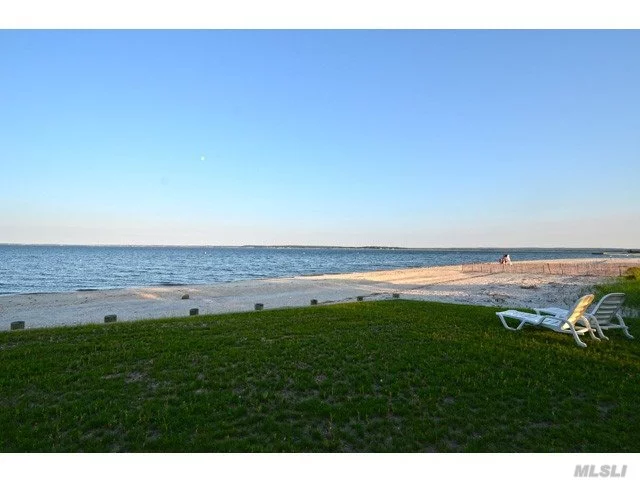 Looking to be directly on a sandy bay beach? This is the opportunity you&rsquo;ve been looking for. Ideal location for a summer fun retreat. Waterside deck overlooks bay with wide sweeping views. Outdoor shower. Adjacent to S. Jamesport Beach which features 3, 000 ft. on Peconic Bay, Tennis Courts, Designated Swimming area, pavilion, and playground.