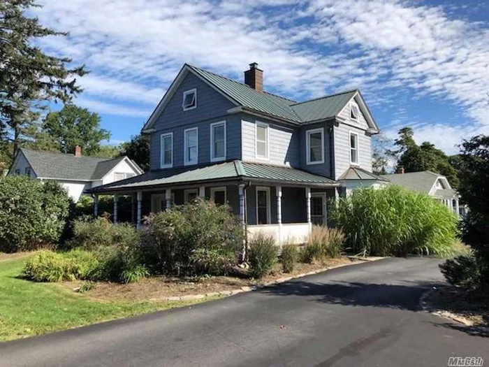 Beautifully Maintained Home With Wrap-Around Porch & Hardwood Floors. Huge Eat In Country Kitchen Recently Remodeled W/ New Stainless Steel Appliances. Conveniently Located Within Half Mile Of Downtown Sayville, Sayville Schools & Railroad Station.