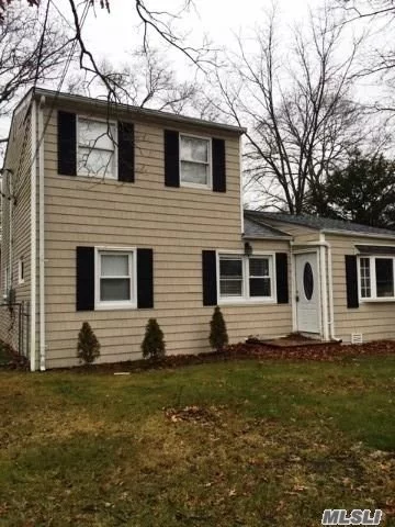 Recently renovated 3 bedroom, 1 bath home features an open floor plan The kitchen has white cabinets, stainless steel appliances and a sparkling tile backsplash. The gray walls compliment the hardwood floors. Updated bath has a beautiful vanity. Located near Canaan Lake with easy access to main roads, shopping, B.N.L., LIRR, L.I.E. and Patchogue Village.