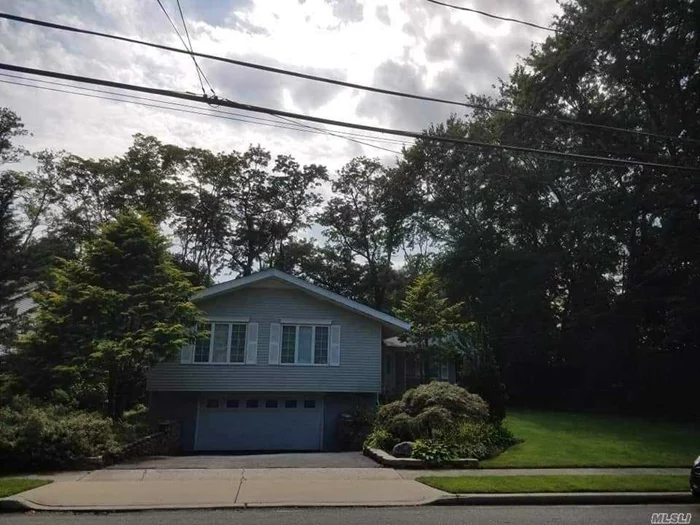 Beautiful Split Level Ranch located on a quiet cul-de-sac conveniently located near Main Street and LIRR. Spacious Sunlit rooms with large yard and new Hot Tub provide perfect home for entertaining. Mint condition and move-in ready 1/1/2020