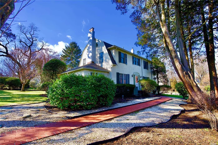 Manicured, oversized property 105x122, Classic Dutch Colonial in Port Washington Estates, 3 Bedrooms, 3 1/2 Baths, Eat in Kitchen (with Insta Hot Water), Spacious Formal Dining Room, Den, Office, 2 car garage, lots of storage, New Roof and R8 air conditioning insulation. Large yard Close to schools, LIRR, Main Street shopping & widely acclaimed Public Library, Port Washington Estates has it all including a Private Beach with dues! This home has all permits in place and CEU on file at TONH!