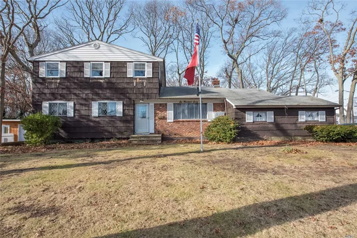 Opportunity Knocks!!! Four Bedroom, 2.5 Bath (1 updated) Colonial. LR w/Fireplace, FDR, Great Room w/Vaulted Ceilings and Double Sliders to Deck. Hardwood Floors Throughout, Full Basement, 2 Car Garage, All Located in West Islip School District.