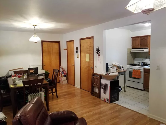 Center of Flushing With Parking Space, Heating . Bright and Clean Wood Floor, Good Size of 2 Bed Room,  Close to Transportation, Super market, etc.