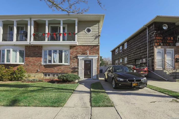 Spacious 3-Bedroom 3-Bth Unit on the 1st Floor of a 2-family House. 1 Full Bth in Full Finished Basement w/Office. Solar Panels installed. Newly Installed Anderson Windows. Long Driveway That Fits Up To 4 Cars. CCTV System Available. Totally Renovated Within Last 2 Years. Large Backyard with Fence. Walkable distance to Q16/Q13/QM2 Buses and Ft Totten Park. This unit comes with Large Washer and Dryer. GNT program offered at the zoned schools. No Pets