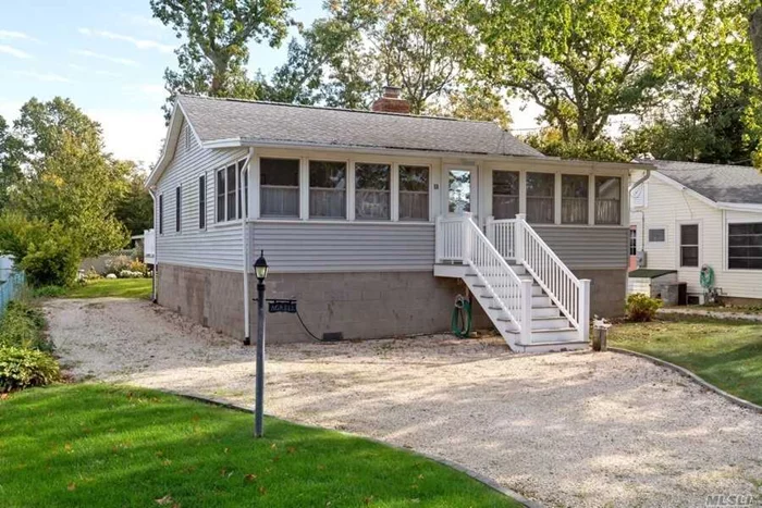 Welcome to your beach getaway! This lovely 3 BR home has a private beach at the end of the street to enjoy sunny summer days. The home has an enclosed 4 season front porch, Living room w/fplc, kitchen, formal dining area and trex deck for entertaining. Property has 2 out buildings, 1 for storage & the 2nd is shower w/hot & cold water & changing area. Home was completely renovated 7 years ago. Come enjoy all the North Fork has to offer!