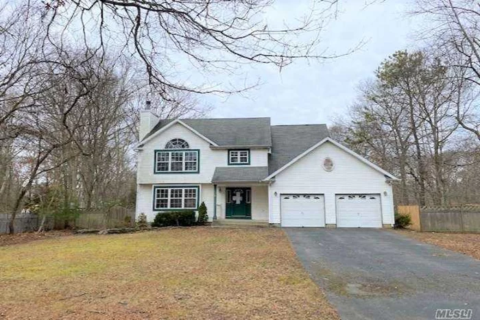 Large colonial style home, open floor plan, LR with cozy fireplace, huge kitchen for entertaining, Den/ Formal Dining room, Master En-suite with two walk in closets, 2 zone central CAC, full basement, amazing private rear yard with wood deck