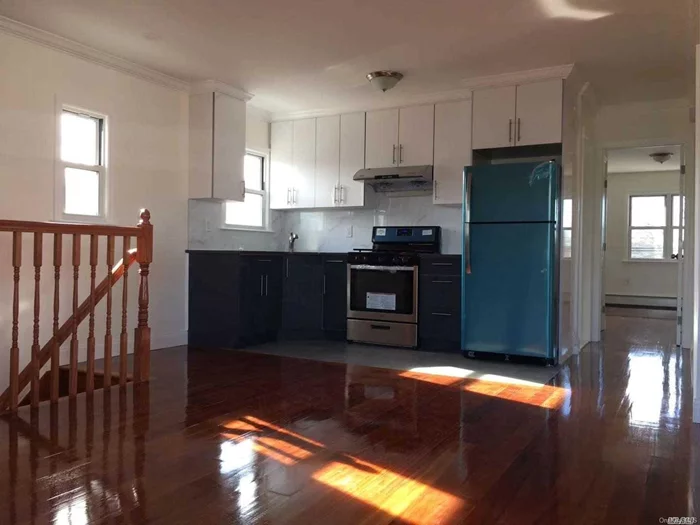 Beautiful 2 Bed Room & 1 Full Bath Apartment Located on The 2 Floor In a New renovated Legal 2 Family House with Big living room, many closet , Fresh Paint, New Wood Floor, New Kitchen, New Bath room School District #26. Walk to School Ms 74 2 Min, . Easy Access To Major Highways.Must to see